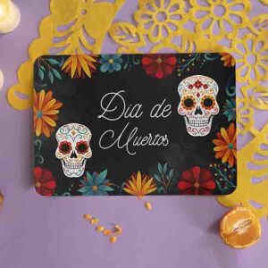 Mantel Individual Día de Muertos Modelo Calavera de Cempasúchil con Calaveras Mexicanas y Flores.